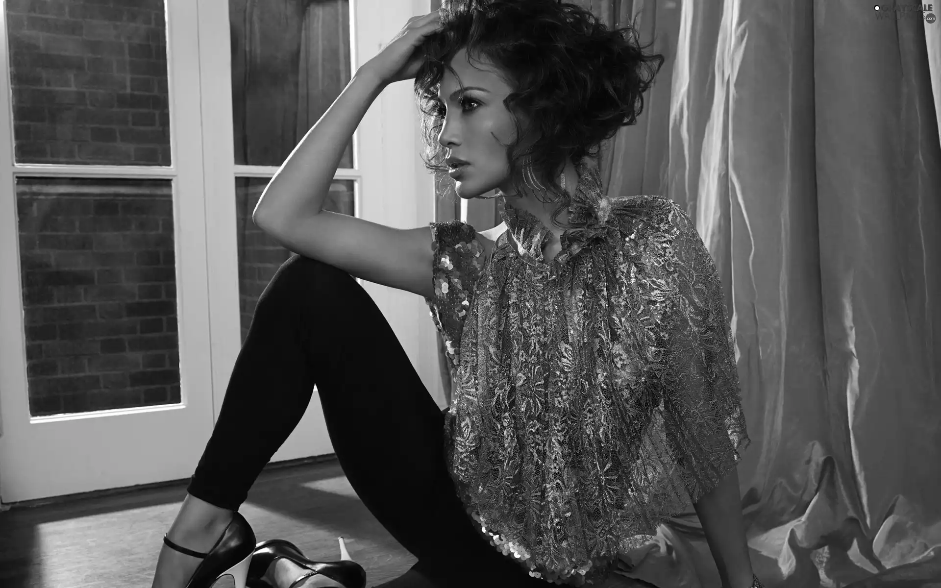 Window, sitting, Jennifer Lopez