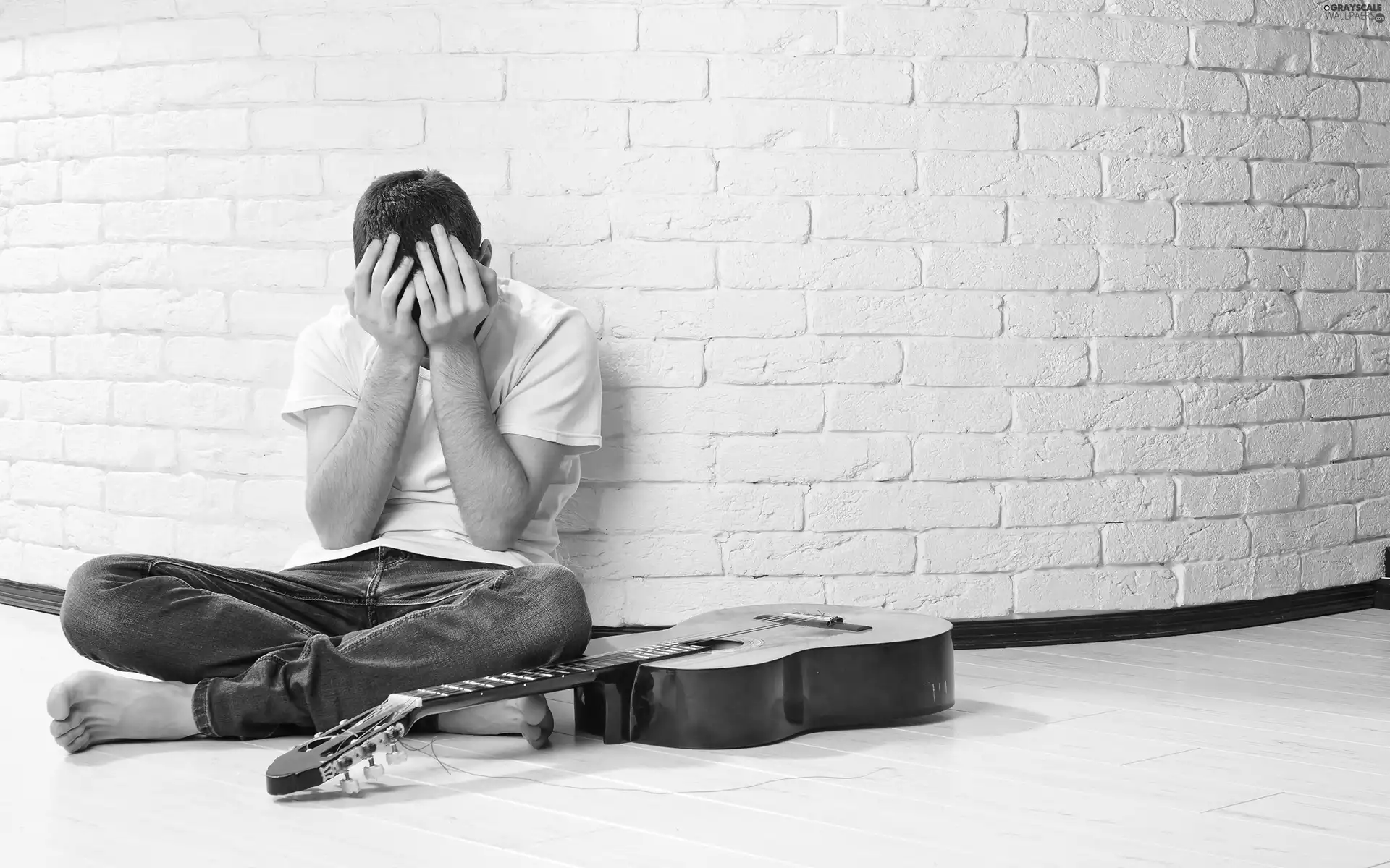 brick, Guitar, a man, wall, sad
