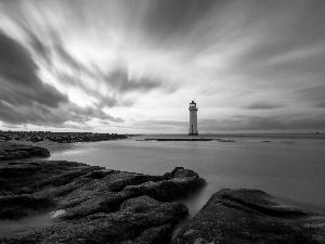Lighthouses, rocks, clouds, sea