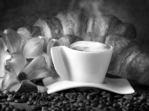 Flowers, croissants, coffee