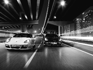 Two cars, Porsche Cayman