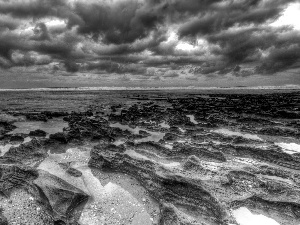 Stones, sea, clouds