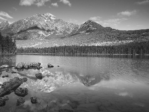 Stones, mountains, lake