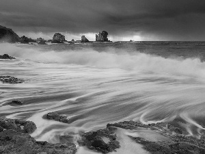 Waves, rocks, sun, sea, west