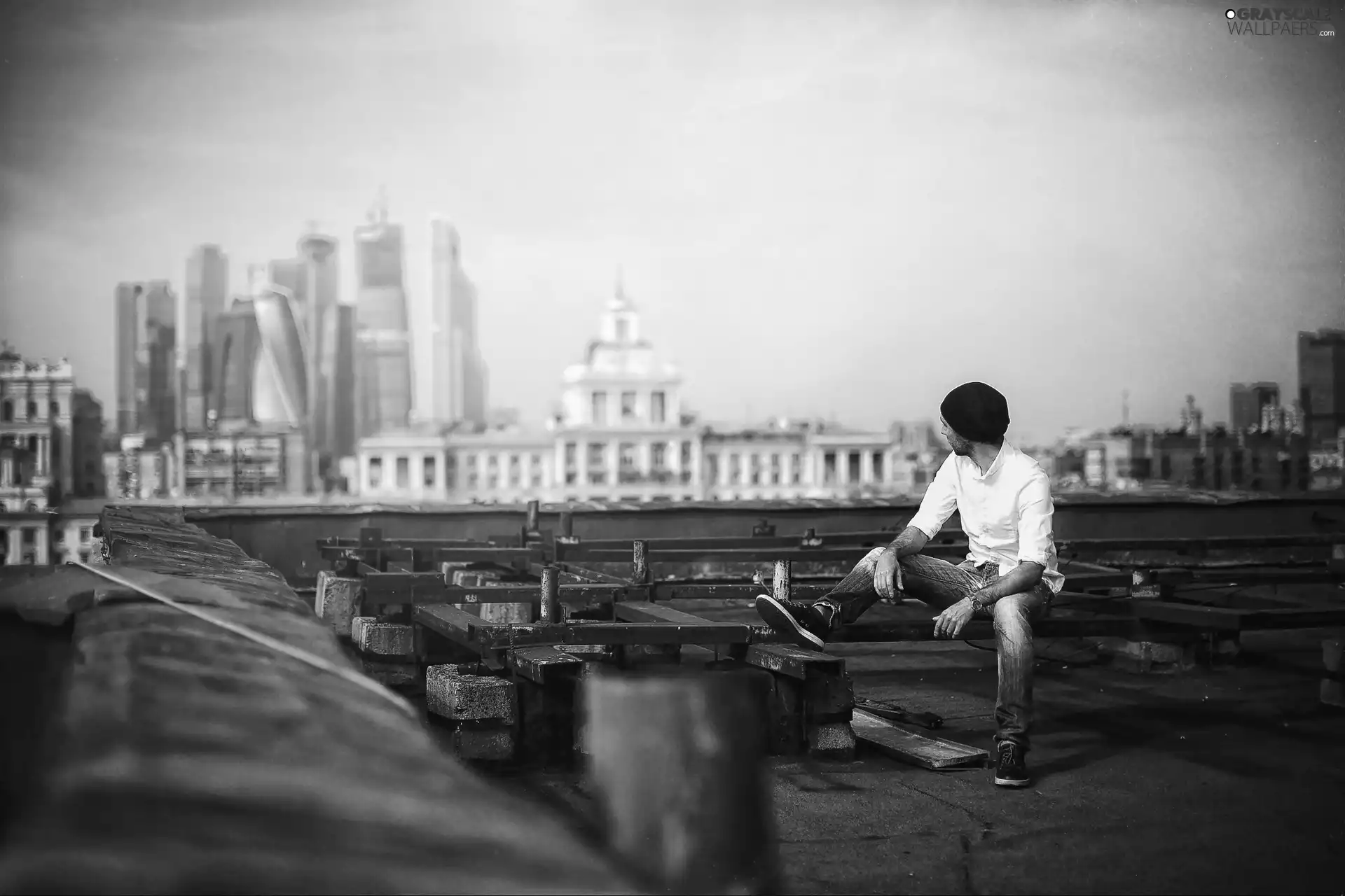 house, the roof, a man, skyscraper