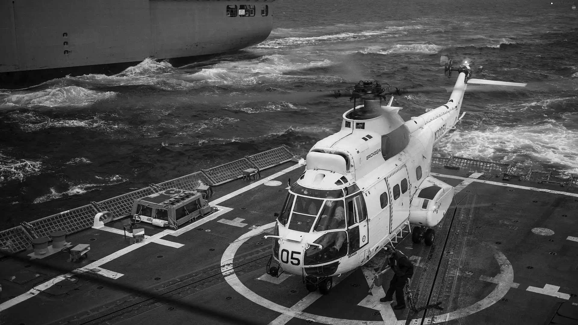 a man, Helicopter, aircraft carrier