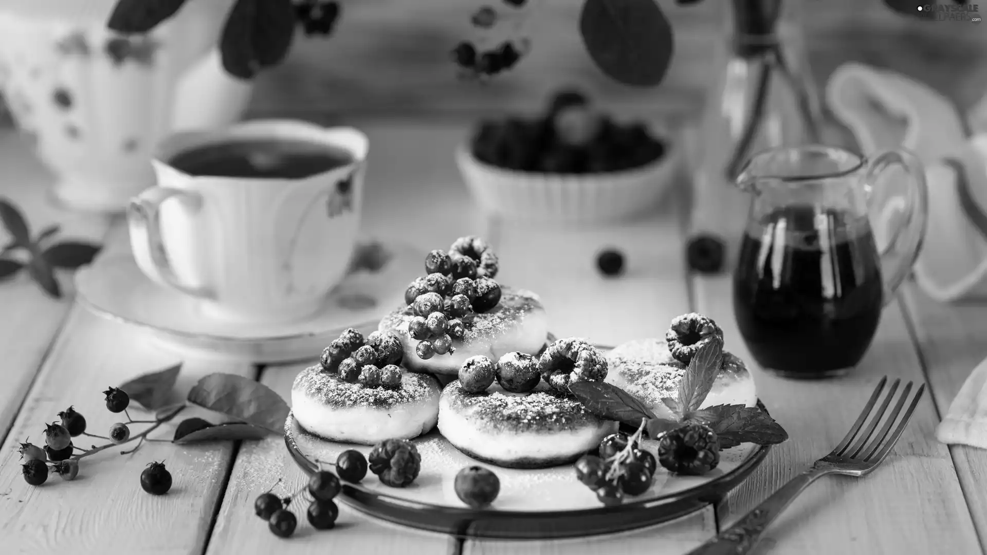 Pancakes, raspberries, juice, blueberries