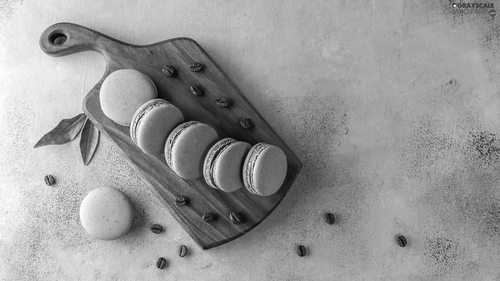 Macaroons, coffee, grains, board