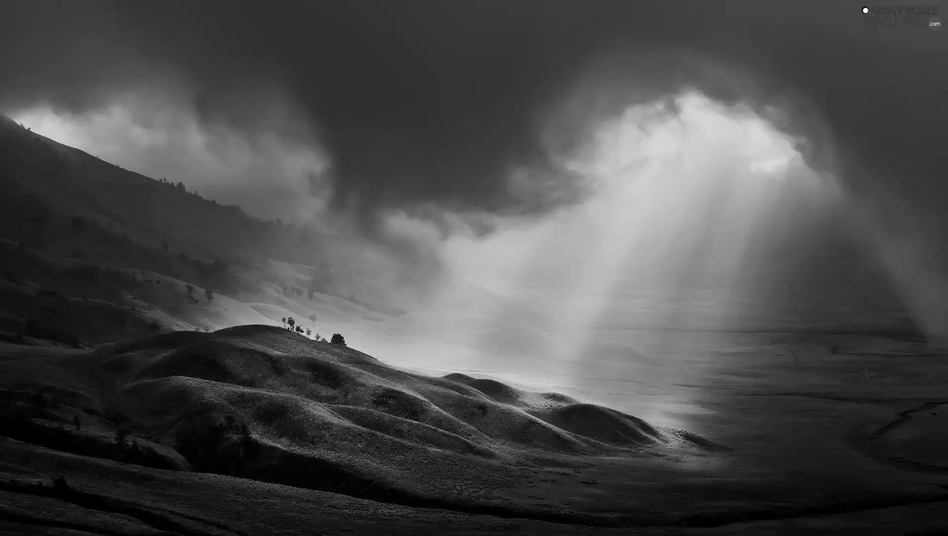 The Hills, clouds, light breaking through sky