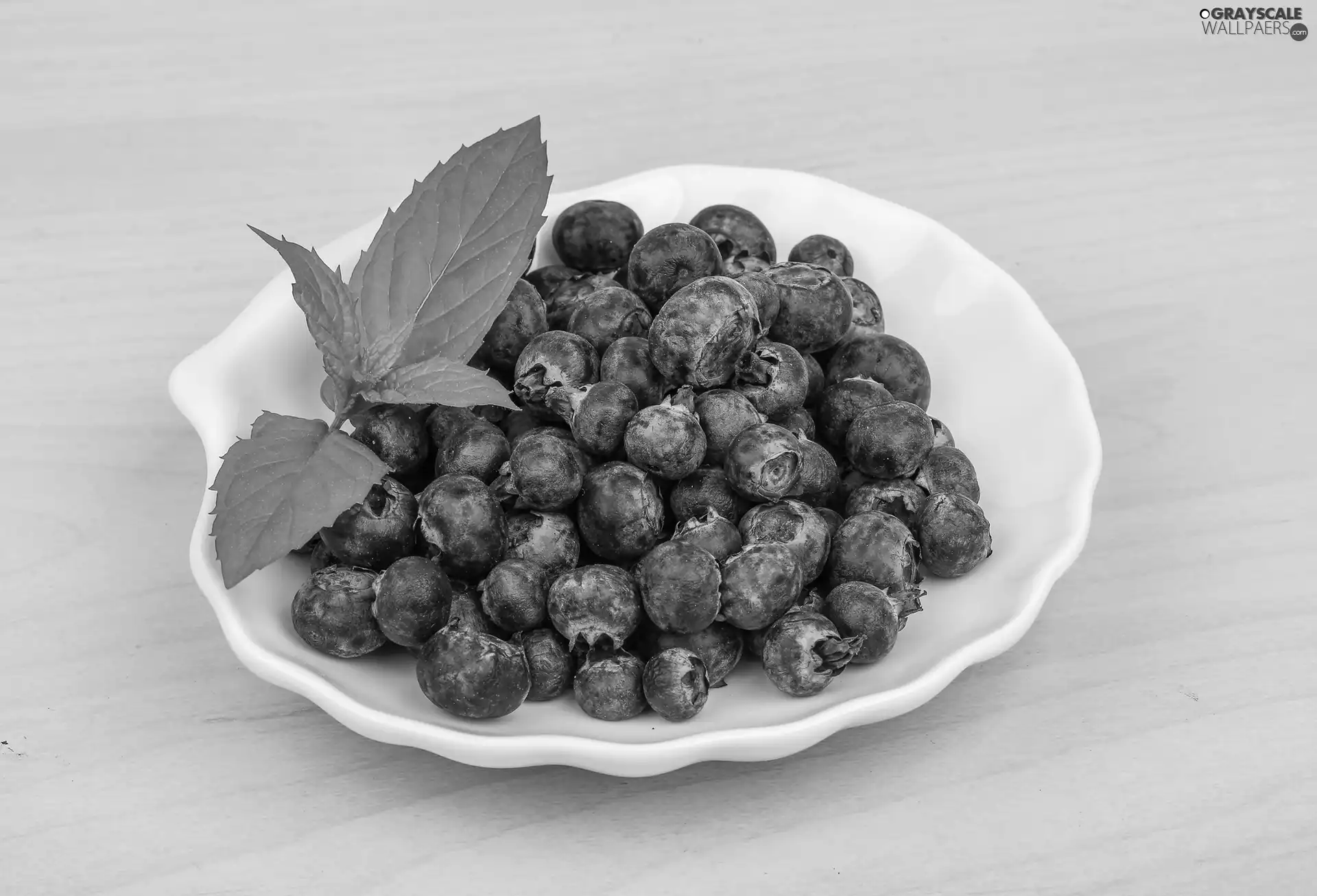 leaves, blueberries, plate
