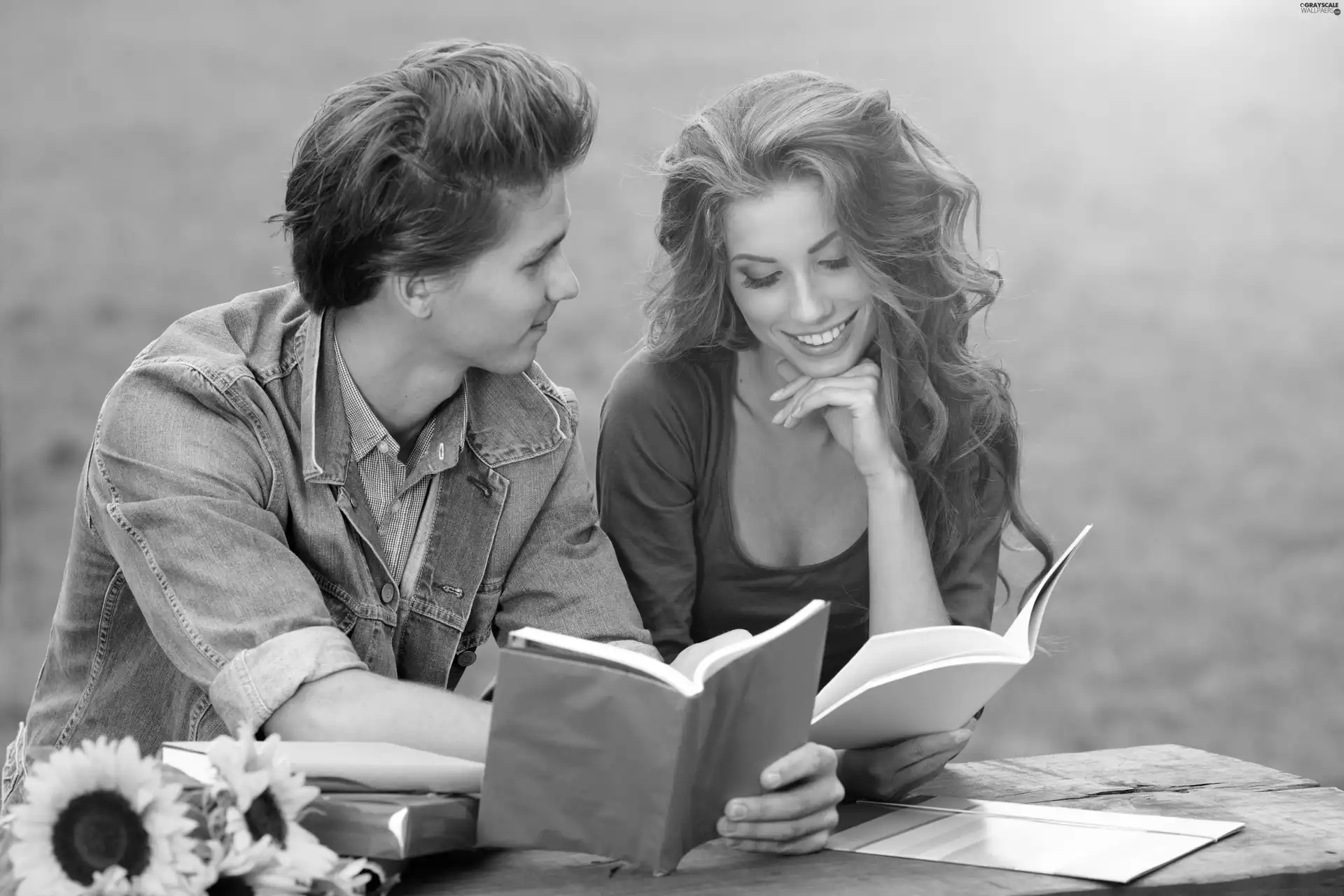 Women, Books, Nice sunflowers, a man