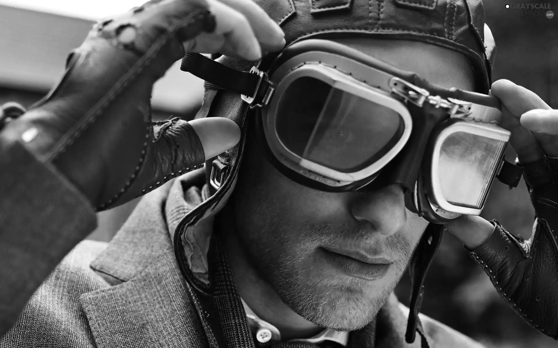 a man, goggles, pilot, model