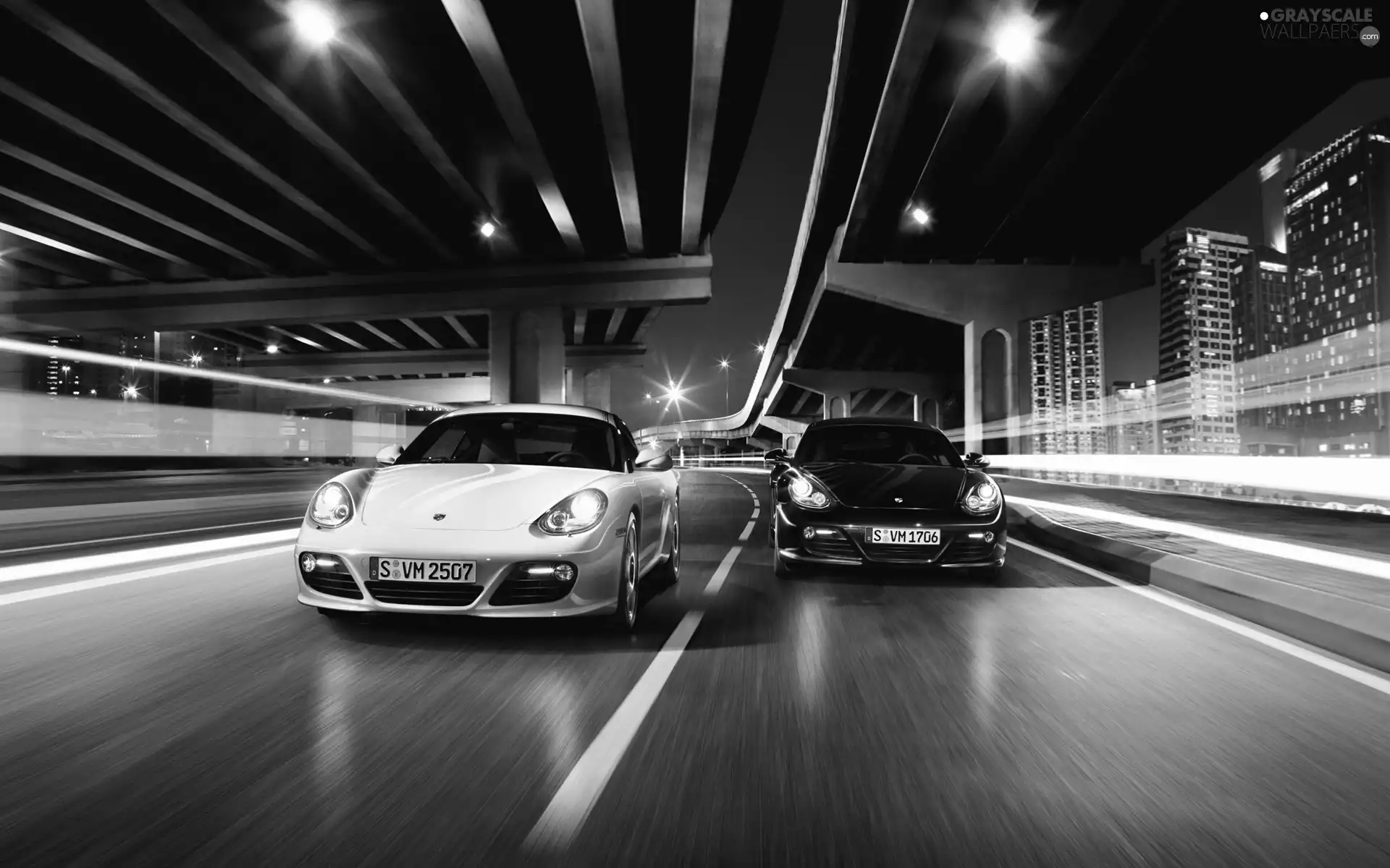 Two cars, Porsche Cayman