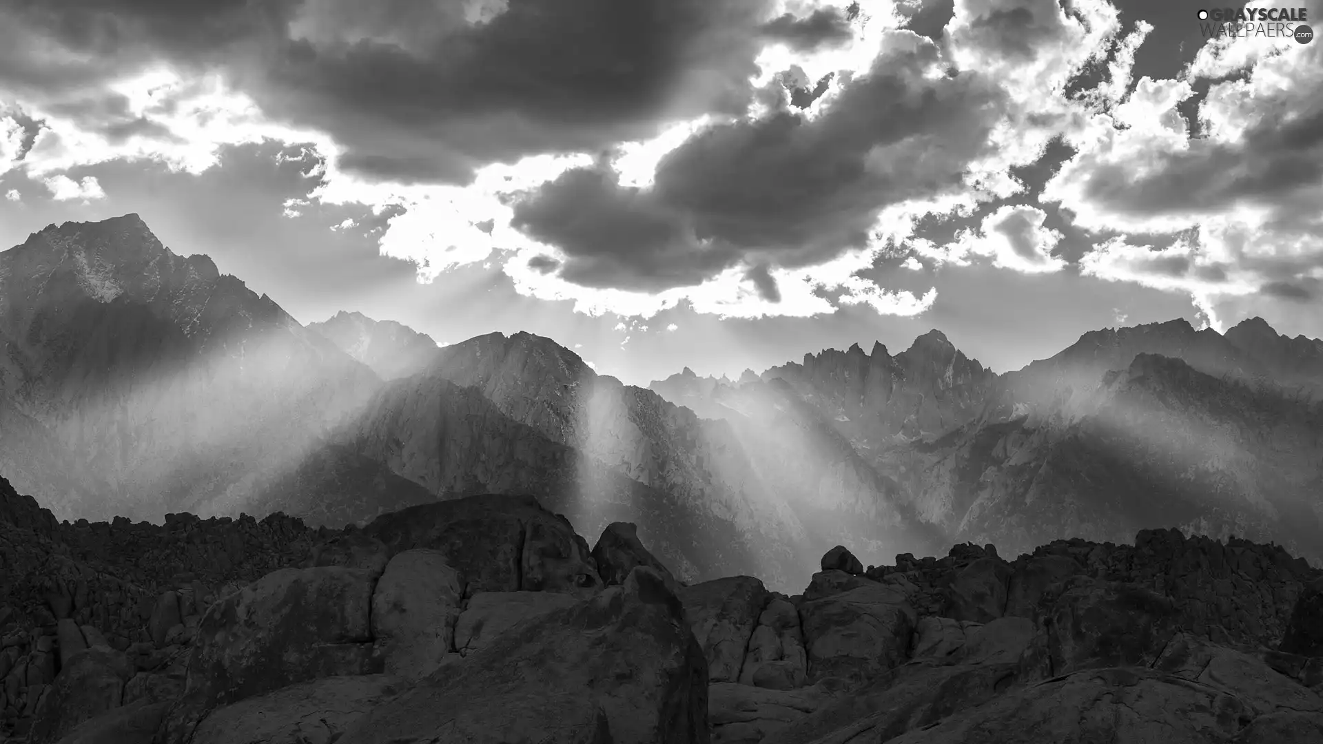 Mountains, rays of the Sun, clouds, peaks