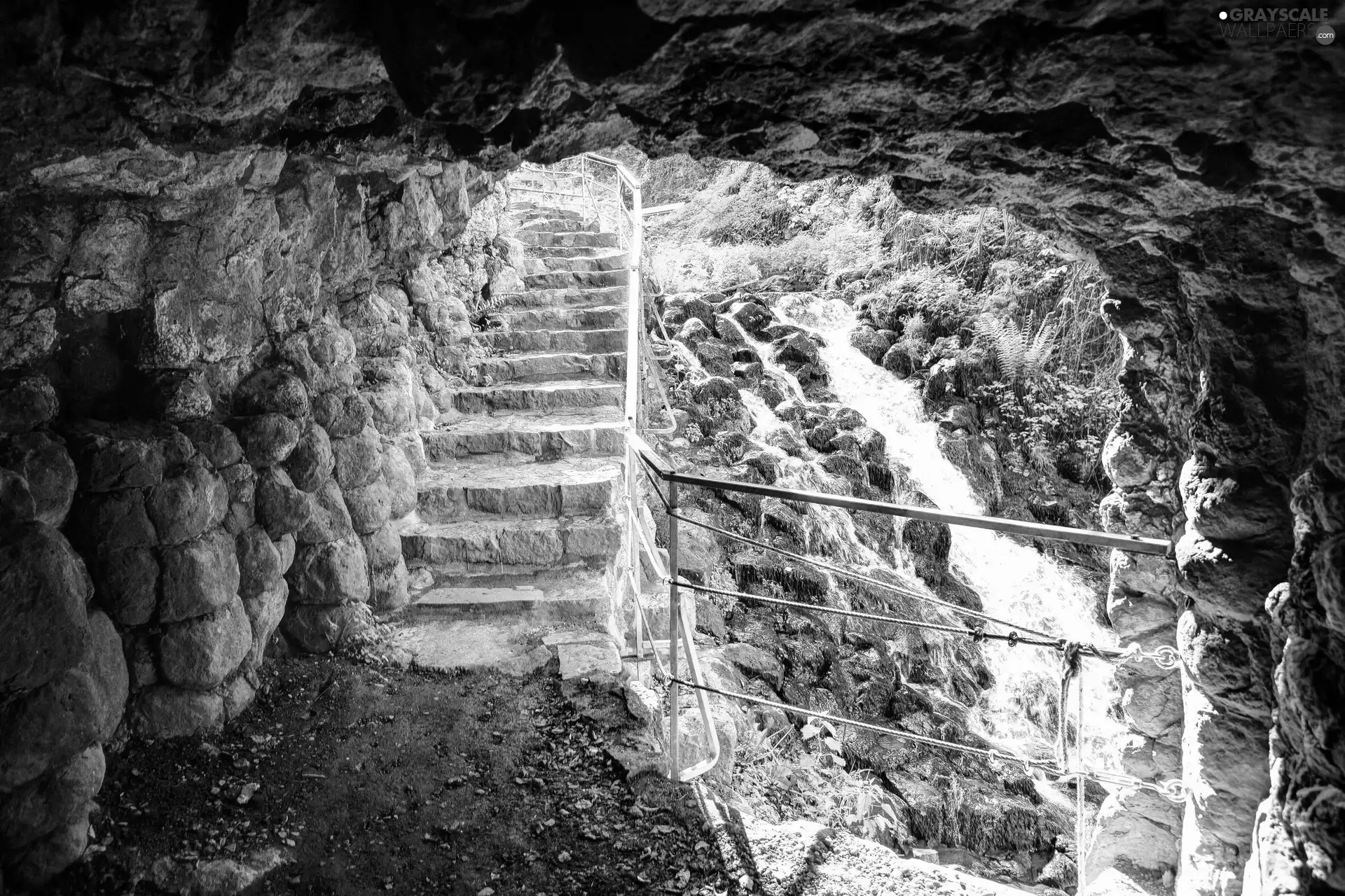 Stairs, waterfall, cave