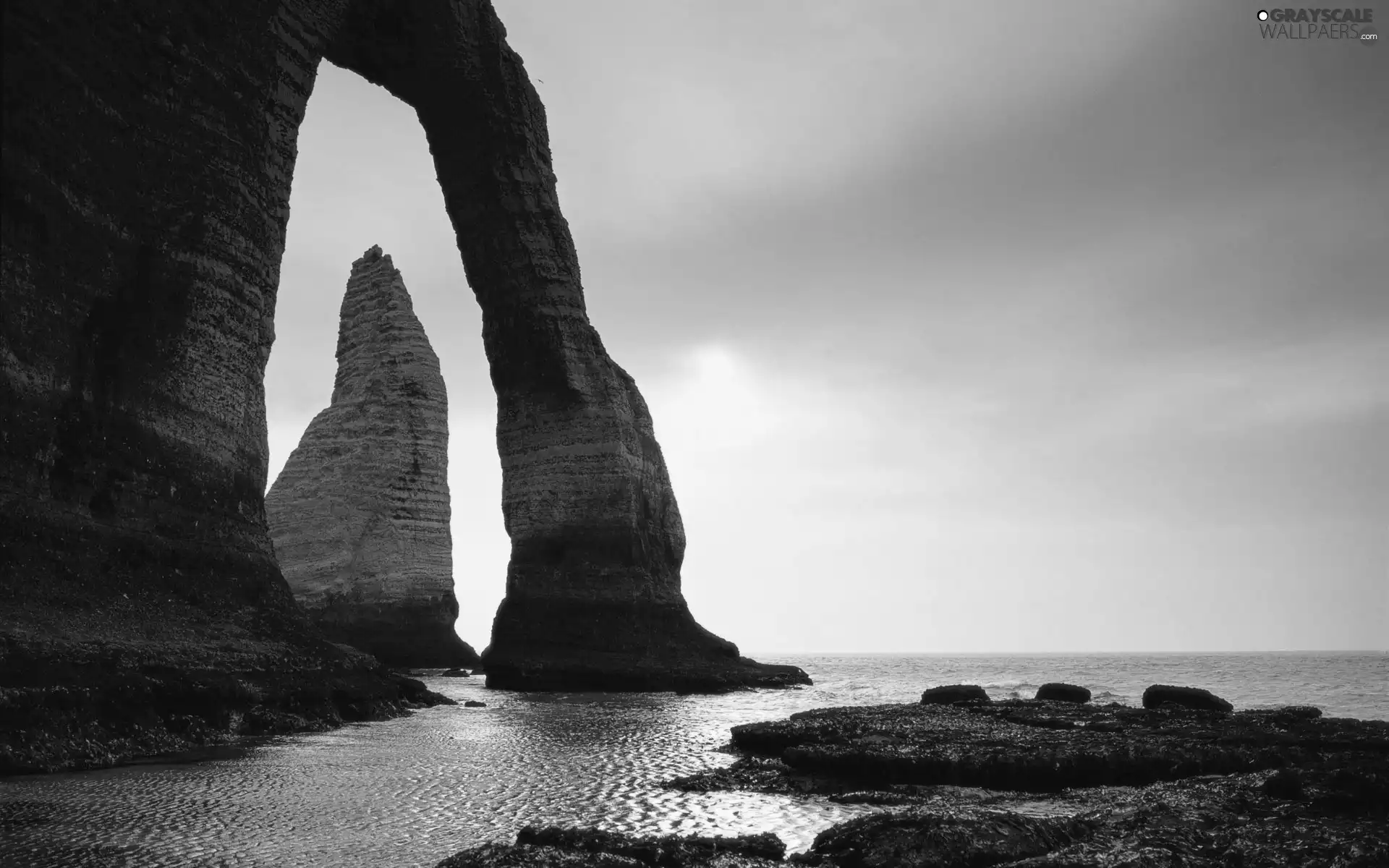 sun, sea, rocks