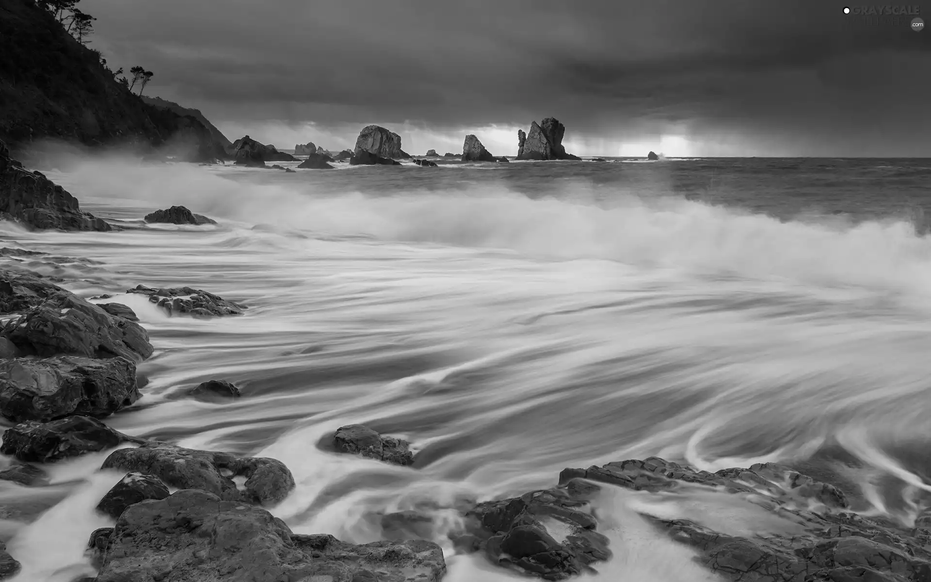 Waves, rocks, sun, sea, west