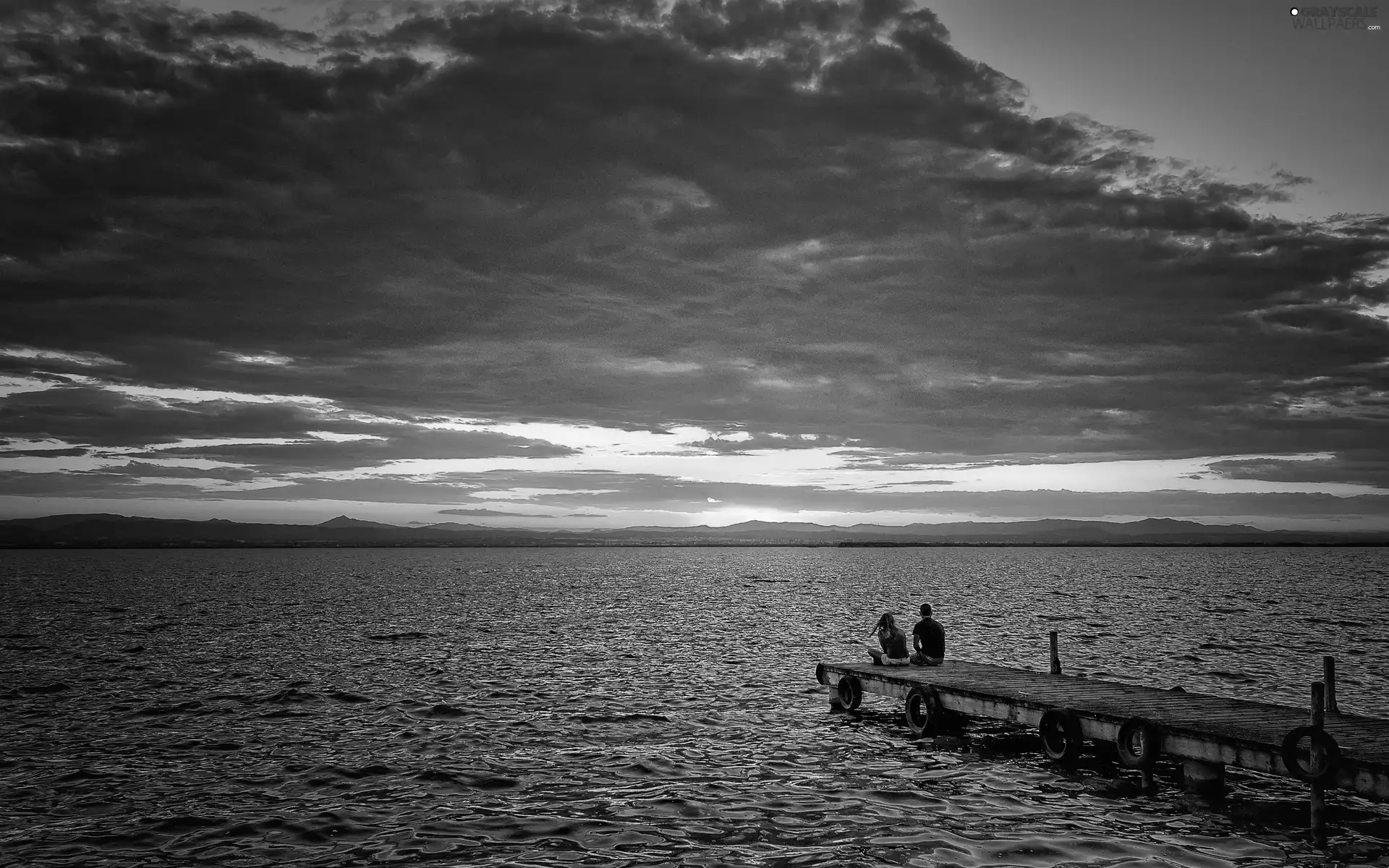 Women, a man, sun, Mountains, west, pier, lake, clouds